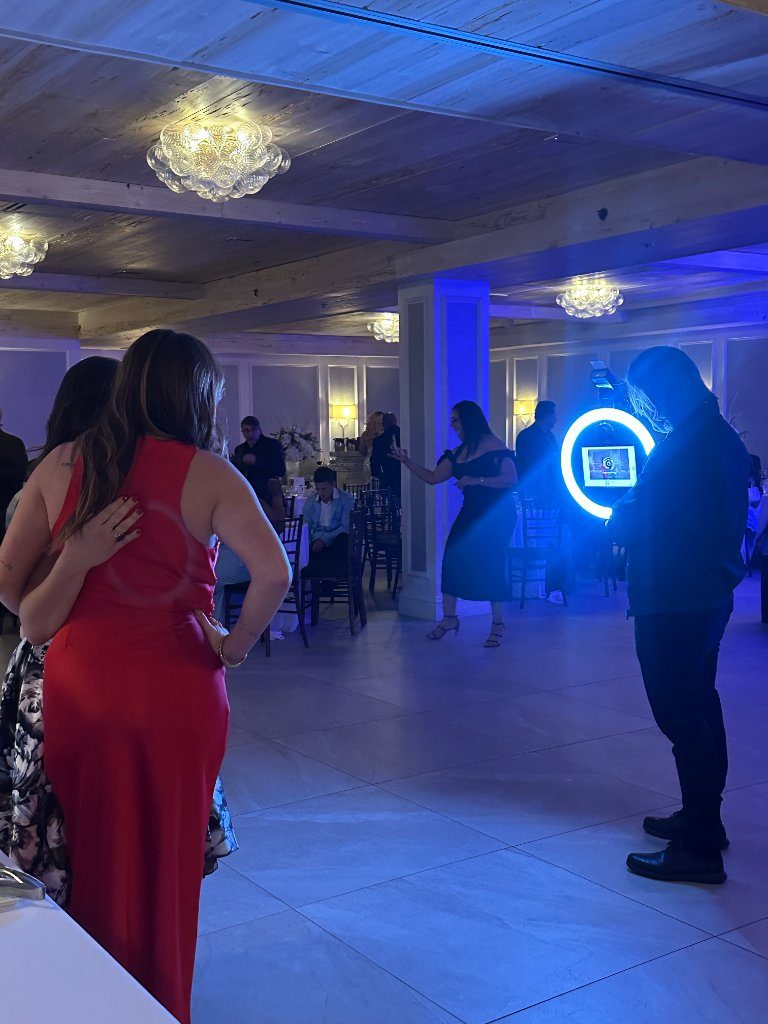 Roaming booth attendant capturing guests at a reception