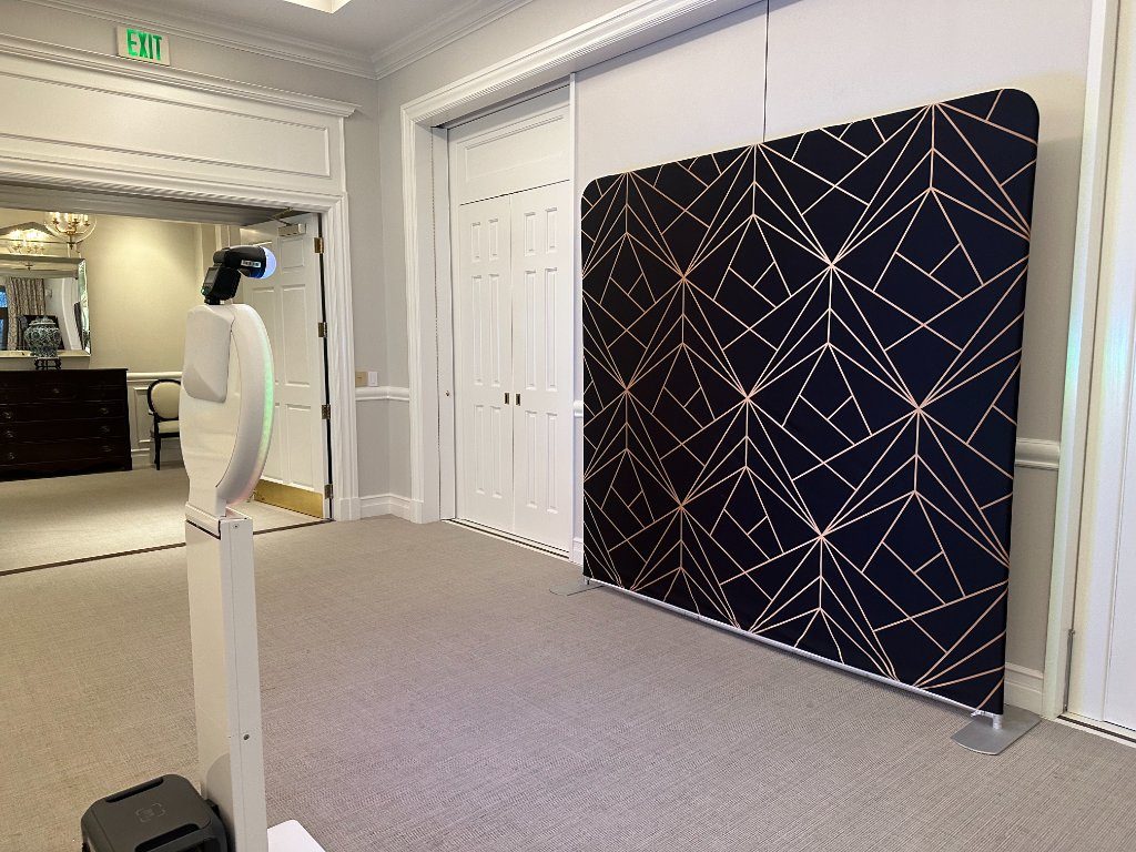Stationary pro cam booth with geometric backdrop
